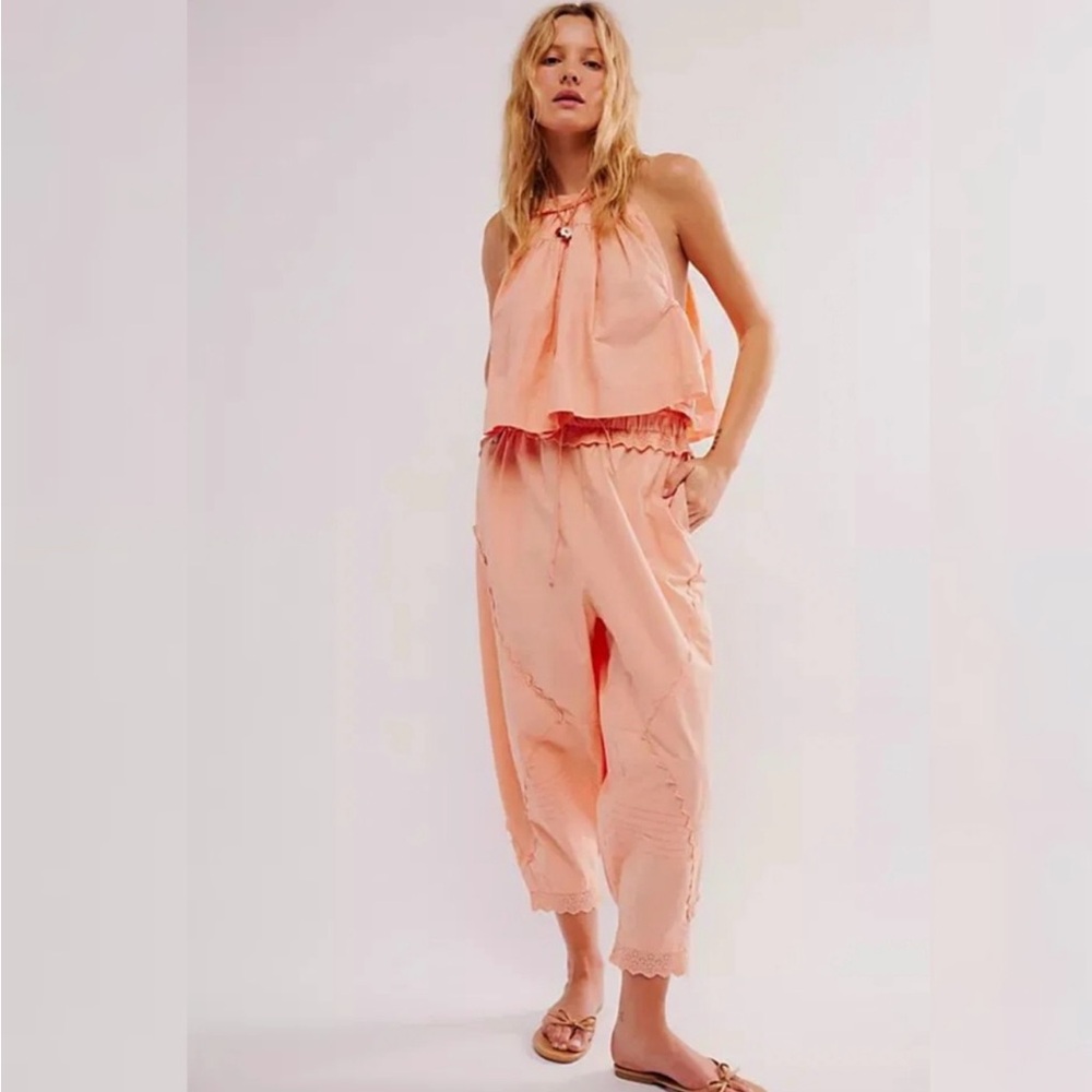 Pink Sleeveless Jumpsuit with V-Neck and Cropped Wide-Leg Pants